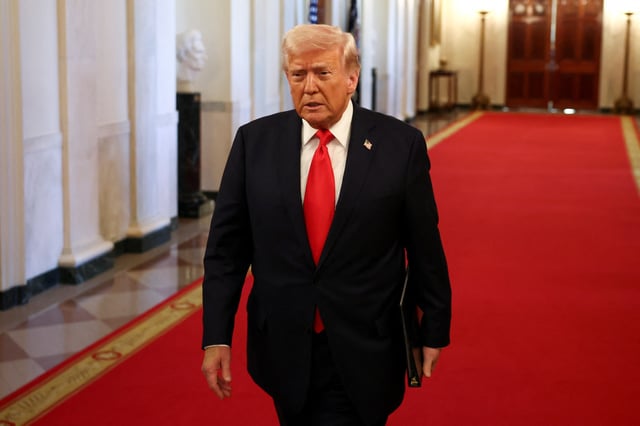 U.S. President Donald Trump arrives for a presentation of the Commander-in-Chief trophy to the U.S. Navy Midshipmen football team of the United States Naval Academy,  at the White House in Washington, D.C., U.S., April 15, 2025. REUTERS/Evelyn Hockstein