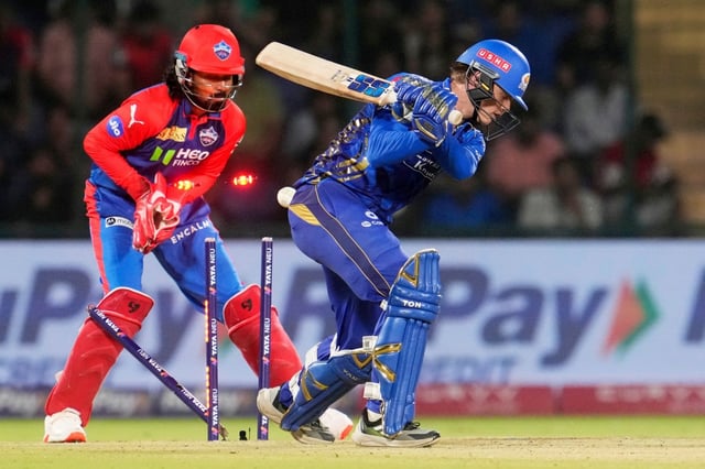 Mumbai Indians’ Ryan Rickelton is bowled out by Delhi Capitals’ Kuldeep Yadav during the Indian Premier League cricket match between Delhi Capitals and Mumbai Indians at Arun Jaitley Stadium in New Delhi, India, Sunday, April 13, 2025. (AP Photo/Manish Swarup)
