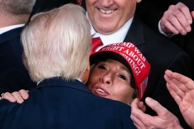 President Donald Trump greets Rep. Marjorie Taylor Greene after addressing a joint session of Congress in the House Chamber of the U.S. Capitol on March 4, 2025.