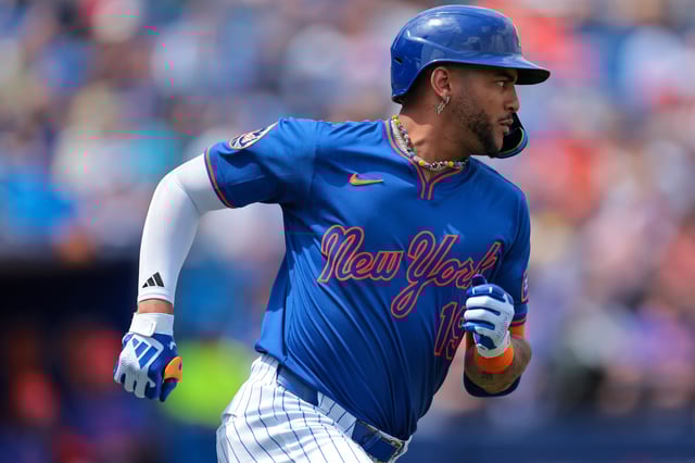 Mar 24, 2025; Port St. Lucie, Florida, USA; New York Mets center fielder Jose Siri (19) hits a single against the New York Yankees during the second inning at Clover Park. Mandatory Credit: Sam Navarro-Imagn Images/FIle photo
