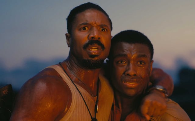 Michael B. Jordan, left, and Miles Caton in “Sinners.”