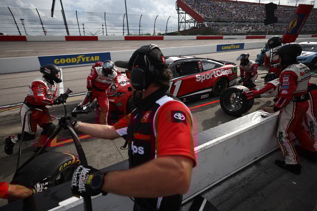 Denny Hamlin, driver of the #11 Sport Clips Haircuts Toyota, pits during the NASCAR Cup Series Goodyear 400 at Darlington Raceway on April 06, 2025 in Darlington, South Carolina.