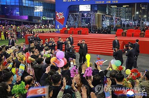 North Korean leader Kim Jong-un (C) attends a ceremony marking the completion of the third-stage section of the Hwasong new town in Pyongyang on April 15, 2025, in this photo published by the Korean Central News Agency on April 16, 2025. (For Use Only in the Republic of Korea. No Redistribution) (Yonhap)