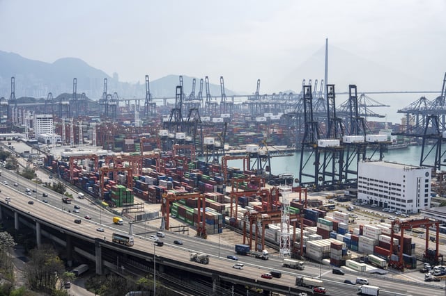 Containers pile up at Kwai Chung Container terminal in Hong Kong, Tuesday, Apr. 8, 2025. (AP Photo/Chan Long Hei)