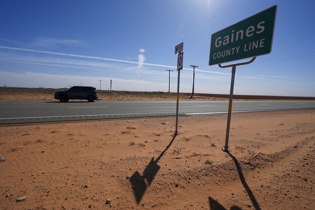 FILE - The Gaines County line is seen along Route 180 Wednesday, Feb. 26, 2025, in Lamesa, Texas. (AP Photo/Julio Cortez, File)