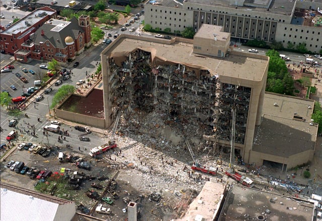 FILE - This aerial view shows the destroyed north side of the Alfred P. Murrah Federal Building in Oklahoma City after a massive bomb blast, April 19, 1995. (AP Photo, File)