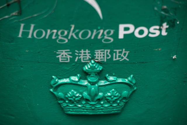 The royal British insignia on an historic mail box is pictured in Hong Kong on October 7, 2015.