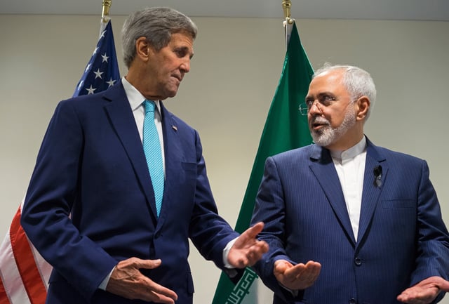 FILE - U.S. Secretary of State John Kerry, left, meets with Iranian Foreign Minister Mohammad Javad Zarif at United Nations headquarters, on Sept. 26, 2015. (AP Photo/Craig Ruttle, File)