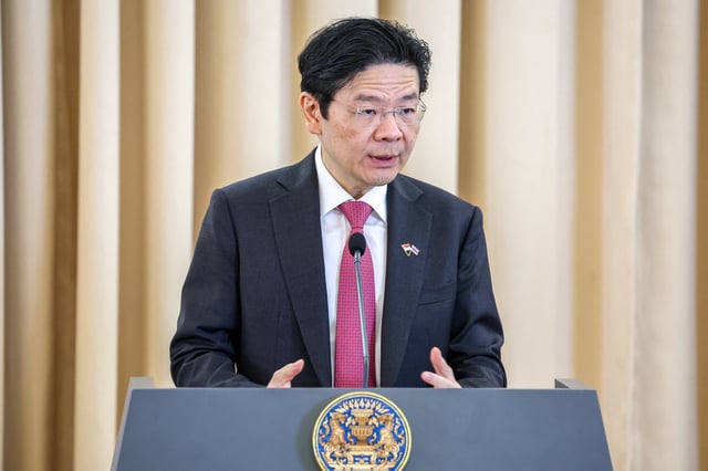Singapore's Prime Minister Lawrence Wong speaks during a signing ceremony and press conference at the Government House, in Bangkok, Thailand, November 28, 2024. REUTERS/Athit Perawongmetha/File Photo