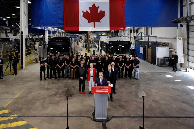 Canada's Prime Minister Mark Carney makes an announcement during his Liberal Party election campaign tour at Nova Bus, in Saint-Eustache, Quebec, Canada April 15, 2025. REUTERS/Carlos Osorio