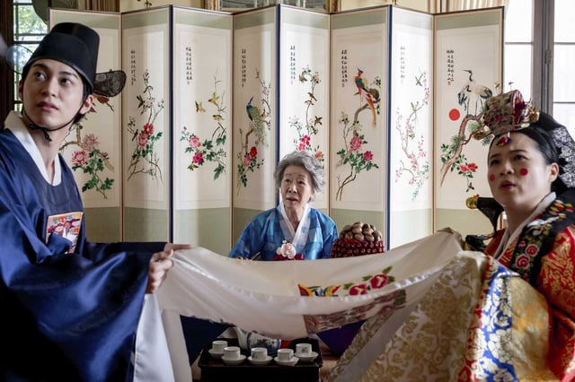 Han Gi-Chan, left, Youn Yuh-Jung and Kelly Marie Tran in “The Wedding Banquet.”