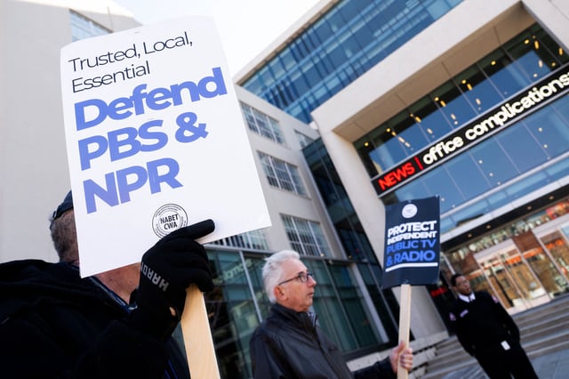 People rally to call on Congress to protect funding for Public Broadcasting Service (PBS) and National Public Radio outside the NPR headquarters in Washington, DC, on March 26, 2025.