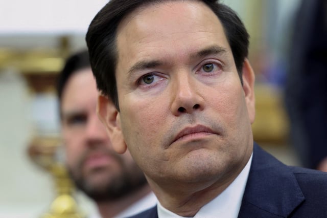 U.S. Secretary of State Marco Rubio looks on during a meeting between U.S. President Donald Trump (not pictured) and El Salvador President Nayib Bukele (not pictured) in the Oval Office at the White House in Washington, D.C., U.S., April 14, 2025. REUTERS/Kevin Lamarque/File Photo