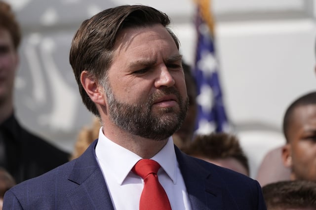 Vice President JD Vance watches as President Donald Trump welcomes the 2025 College Football National Champions, the Ohio State University football team, on the South Lawn of the White House, Monday, April 14, 2025, in Washington. (AP Photo/Alex Brandon)