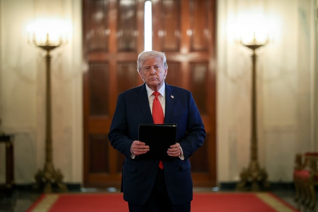 U.S. President Donald Trump arrives for a presentation ceremony for the Commander-in-Chief Trophy to the U.S. Naval Academy in the East Room of the White House on April 15, 2025 in Washington, DC.