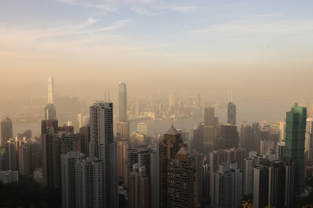 Victoria Harbour and the Central Business District of Hong Kong, China, April 14, 2025. REUTERS/Tyrone Siu/File Photo