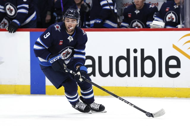 Apr 7, 2025; Winnipeg, Manitoba, CAN; Winnipeg Jets left wing Alex Iafallo (9) skates with the puck against the St. Louis Blues in the first period at Canada Life Centre. Mandatory Credit: James Carey Lauder-Imagn Images/ File Photo