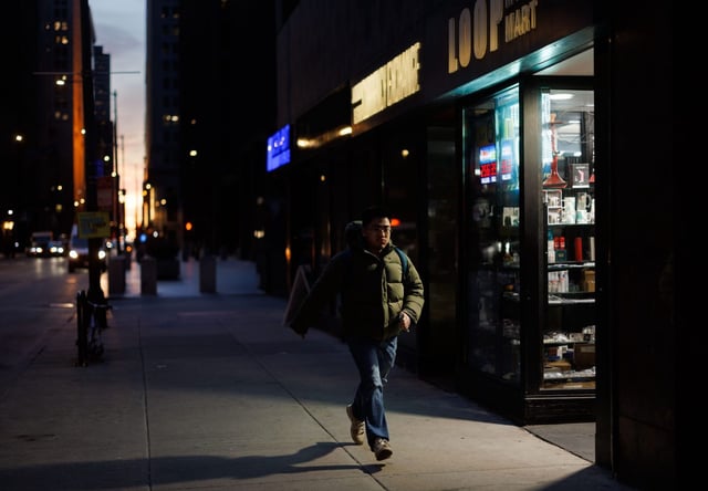 People walk through the Chicago&#39;s Loop shortly after sunset, March 11, 2025. Ald. Brian Hopkins, 2nd, has been working on an 8 p.m. teen curfew after a tourist was shot in front of a movie theater in the 400 block of North Columbus. (Armando L. Sanchez/Chicago Tribune)