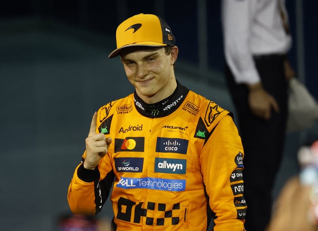 Formula One F1 - Bahrain Grand Prix - Bahrain International Circuit, Sakhir, Bahrain - April 13, 2025 McLaren's Oscar Piastri celebrates after winning the Bahrain Grand Prix REUTERS/Rula Rouhana/ File Photo
