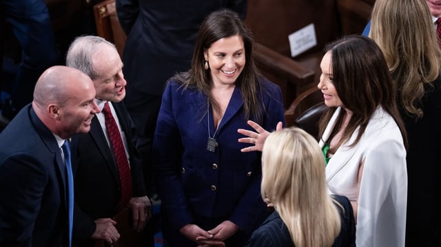 Rep. Elise Stefanik speaks with Republican lawmakers and Trump cabinet members on the U.S. House floor ahead of Trump's speech to a joint session of Congress on March 4. Photo: Tom Williams/CQ-Roll Call, Inc via Getty Images