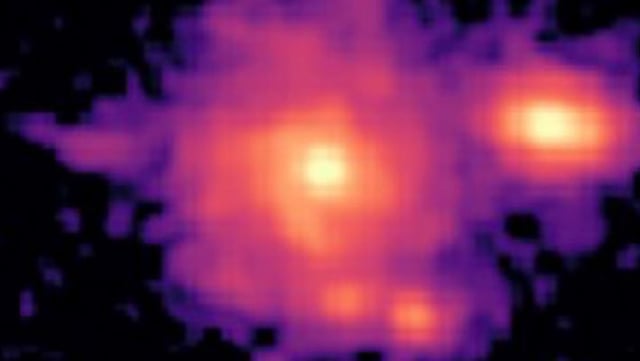 This image of Zhúlóng, the most distant spiral galaxy discovered to date, shows its remarkably well-defined spiral arms, a central old bulge, and a large star-forming disk, resembling the structure of the Milky Way. Image credit: NASA / CSA / ESA / M. Xiao, University of Geneva / G. Brammer, Niels Bohr Institute / Dawn JWST Archive.
