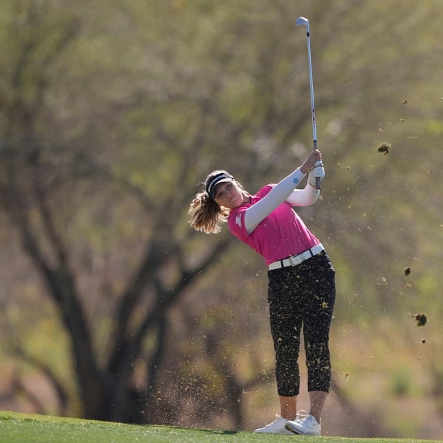Brooke Henderson, of Canada, hits from the 14th fairway during the first round of the Ford Championship LPGA golf event, Thursday, March 27, 2025, in Phoenix. (AP Photo/Matt York)