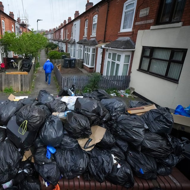 BIRMINGHAM, ENGLAND - APRIL 15: Uncollected household waste and rubbish blights Primrose Avenue, in Sparkbrook, as Birmingham council refuse collectors continue their strike on April 15, 2025 in Birmingham, England. On Monday union members voted to reject a council offer to end the refuse workers' strike, as the government announced it had called on office-based military personnel to help the council clear rubbish from Birmingham's streets. Rubbish collectors and members of Unite began intermittent strikes earlier this year over Birmingham City Council's plans to downgrade some staff and reduce their pay, and on March 11 refuse workers declared an indefinite strike after the council's move to use agency staff for bin collections. A major incident has been declared in the city, as uncollected rubbish continues to pile up and case rat infestation.  (Photo by Christopher Furlong/Getty Images) *** BESTPIX ***