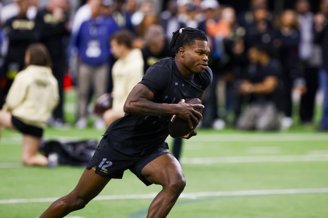 Apr 4, 2025; Boulder, CO, USA; Colorado Buffaloes wide receiver Travis Hunter (12) runs drills at the University of Colorado NFL Showcase at the CU Indoor Practice Facility. Mandatory Credit: Michael Ciaglo-Imagn Images/File photo