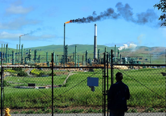 The city of Benicia was given a shelter in place alert and areas south of the Valero Refinery were evacuated after a power outage caused a flare up sending plumes of black smoke across Interstate 680. (Chris Riley/Times-Herald)