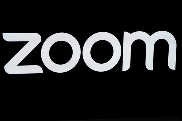 The Zoom Video Communications logo is pictured at the NASDAQ MarketSite in New York, New York, U.S., April 18, 2019.  REUTERS/Carlo Allegri/File Photo