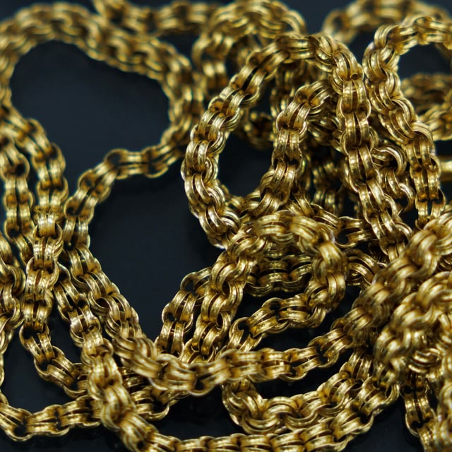 LONDON, ENGLAND - APRIL 16: A gold chain on countertop in a jeweller in Hatton Gardens on April 16, 2025 in the Hatton Garden area of London, England. This morning, the intraday spot price of gold surpassed $3,300 per ounce for the first time, as investors sought safety in the precious metal amid market turmoil sparked by US President Trump's tariffs and a burgeoning trade war with China. (Photo by Dan Kitwood/Getty Images)