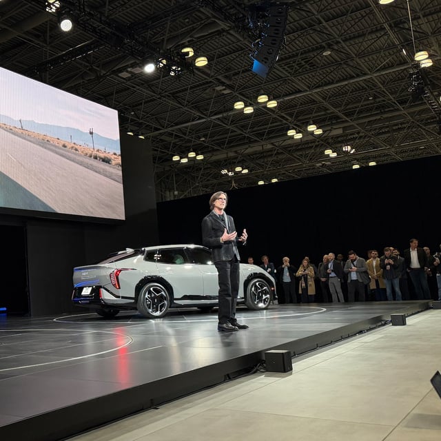 A Kia K4 Hatchback and a Kia EV4 GT-Line are displayed during the New York International Auto Show Press Preview in New York on Wednesday.