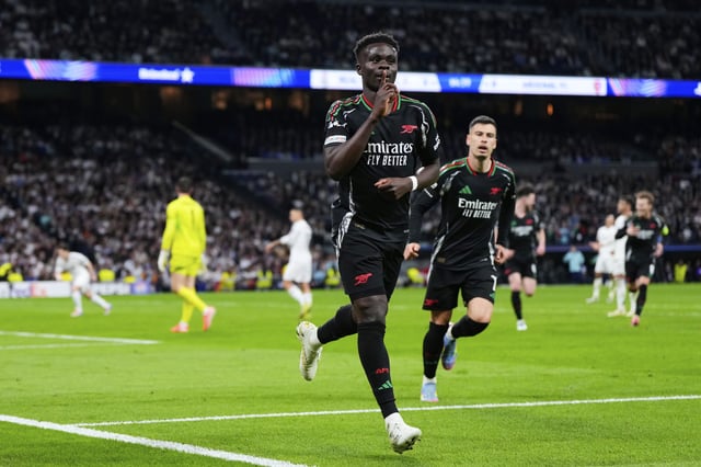 Arsenal's Bukayo Saka celebrates after scoring the opening goal against Real Madrid.