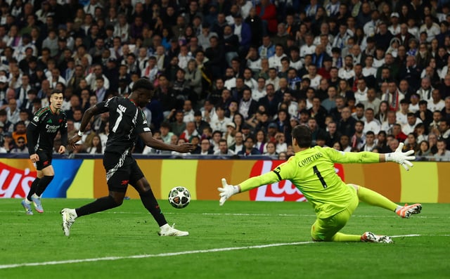 Saka opened the scoring for Arsenal with a delicate dink over the Real Madrid goalkeeper.