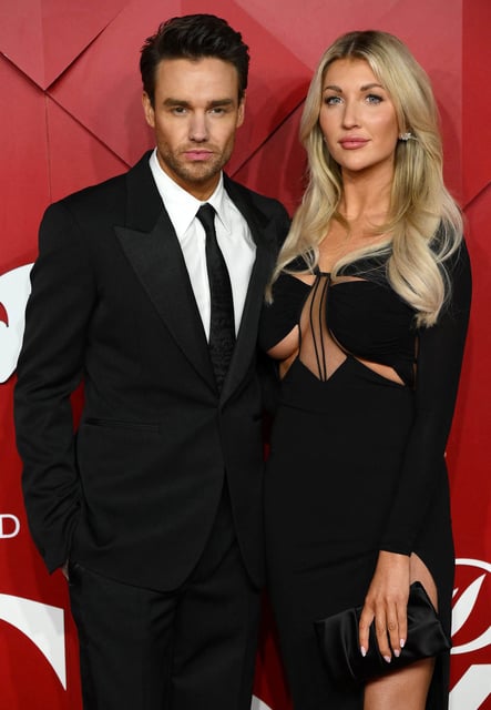 Liam Payne and Katie Cassidy  pose on the red carpet at The 2022 Fashion Awards in London on Dec. 5, 2022.
