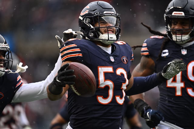 Dec 31, 2023; Chicago, Illinois, USA;  Chicago Bears linebacker T.J. Edwards (53) celebrates after intercepting an Atlanta Falcons pass in the first half at Soldier Field. Mandatory Credit: Jamie Sabau-USA TODAY Sports/File Photo