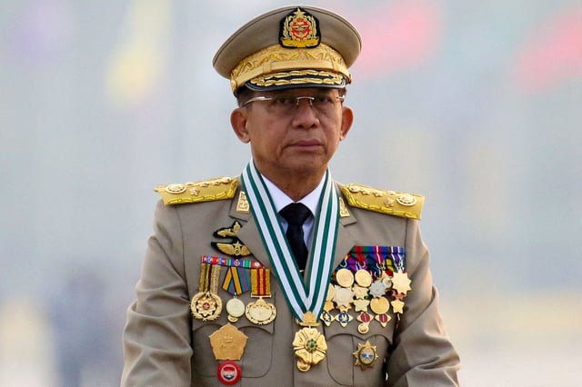 Myanmar's junta chief Senior General Min Aung Hlaing, who ousted the elected government in a coup, presides at an army parade on Armed Forces Day in Naypyitaw, Myanmar, March 27, 2021. REUTERS/Stringer/File Photo