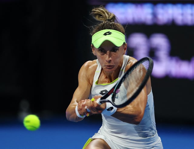 Tennis - WTA 1000 - Qatar Open - Khalifa International Tennis and Squash Complex, Doha, Qatar - February 13, 2024 Ukraine's Lesia Tsurenko  in action during her round of 32 match against Tunisia's Ons Jabeur REUTERS/Ibraheem Al Omari