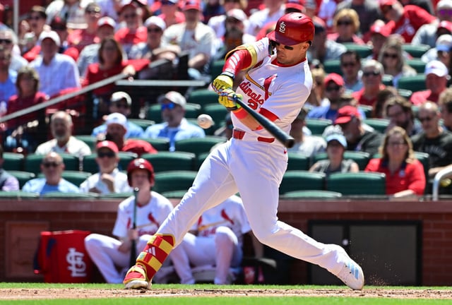Apr 16, 2025; St. Louis, St. Louis Cardinals outfielder Lars Nootbaar (21) hits a three-run home run in the fifth inning against the Houston Astros at Busch Stadium. Mandatory Credit: Tim Vizer-Imagn Images