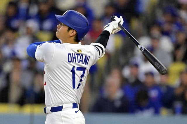 Apr 16, 2025; Los Angeles, California, USA;  Los Angeles Dodgers designated hitter Shohei Ohtani (17) connects on a solo home run in the first inning against the Colorado Rockies at Dodger Stadium. Mandatory Credit: Jayne Kamin-Oncea-Imagn Images