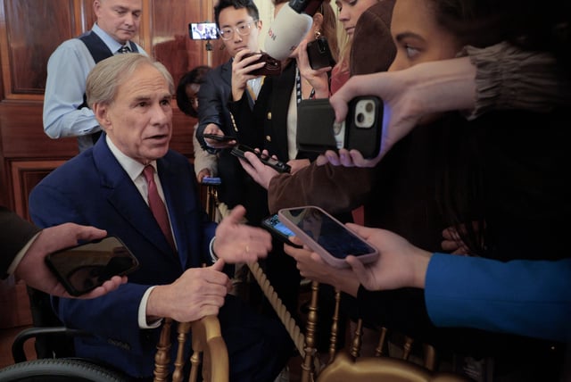 Texas Governor Greg Abbott talks to reporters after U.S. President Donald Trump signed an executive order to reduce the size and scope of the Education Department during a ceremony in the East Room of the White House on March 20, 2025 in Washington, DC.