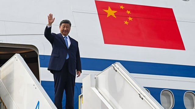 China's President Xi Jinping upon his departure to Cambodia at the Bunga Raya VIP complex of Kuala Lumpur International Airport in Sepang. 