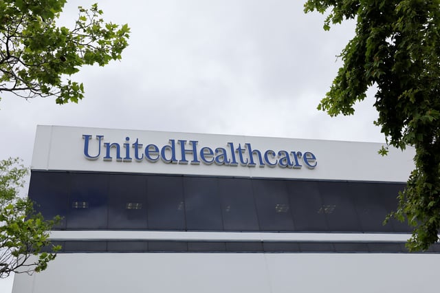 The corporate logo of the UnitedHealth Group appears on the side of one of their office buildings in Santa Ana, California, U.S., April 13, 2020.      REUTERS/Mike Blake