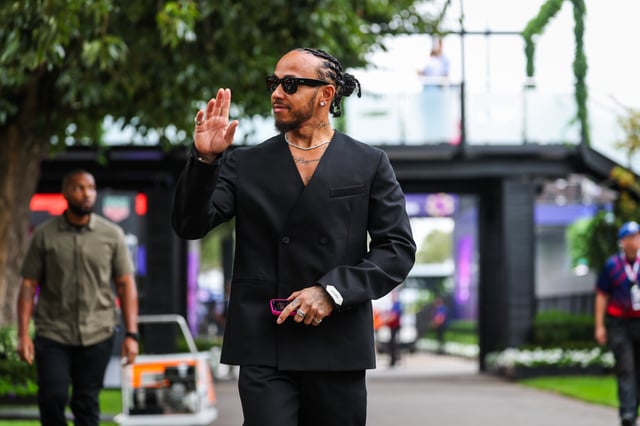 Lewis Hamilton of Great Britain and Ferrari walks in the paddock during previews ahead of the F1 Grand Prix of Australia at Albert Park Grand Prix Circuit on March 13, 2025 in Melbourne, Australia.