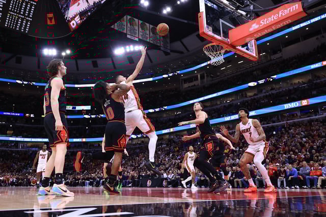Herro (No. 14) scored 38 points as the Heat's season continues.