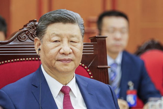 China&#39;s President Xi Jinping attends a meeting with Vietnam&#39;s Prime Minister Pham Minh Chinh (not pictured) at the Office of the Party Central Committee in Hanoi on April 14, 2025.