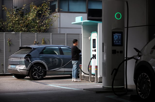 A Hyundai Ioniq 5 electric vehicle is charged at Chaevi Stay Charging Station in Seoul, South Korea, October 18, 2023.   REUTERS/Kim Hong-Ji/File Photo
