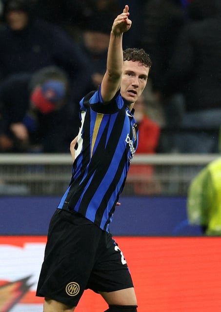 Soccer Football - Champions League - Quarter Final - Second Leg - Inter Milan v Bayern Munich - San Siro, Milan, Italy - April 16, 2025 Inter Milan's Benjamin Pavard celebrates scoring their second goal REUTERS/Claudia Greco/File Photo