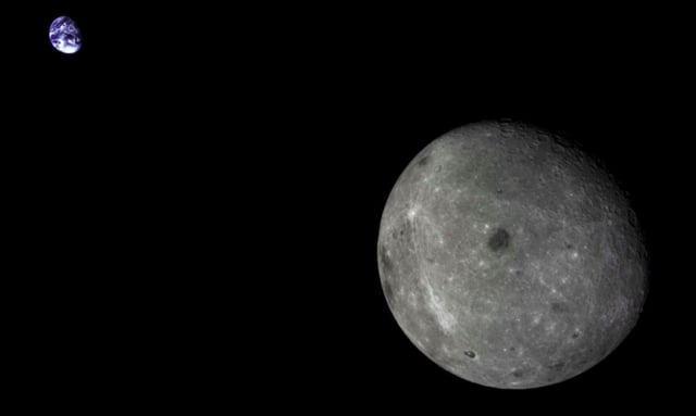 The far side of the moon and distant Earth imaged by the Chang’e-5 T1 mission service module in 2014.