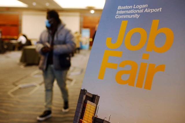 A job seeker leaves the job fair for airport related employment at Logan International Airport in Boston, Massachusetts, U.S., December 7, 2021.   REUTERS/Brian Snyder/File Photo